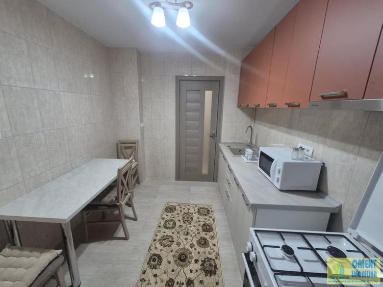 Dacia, bd. Tomis, de inchiat 2 camere, decomandat, mobilat, renovat - 13