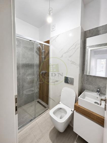 Apartament cu 3 camere decomandat, mobilat în Tractorul