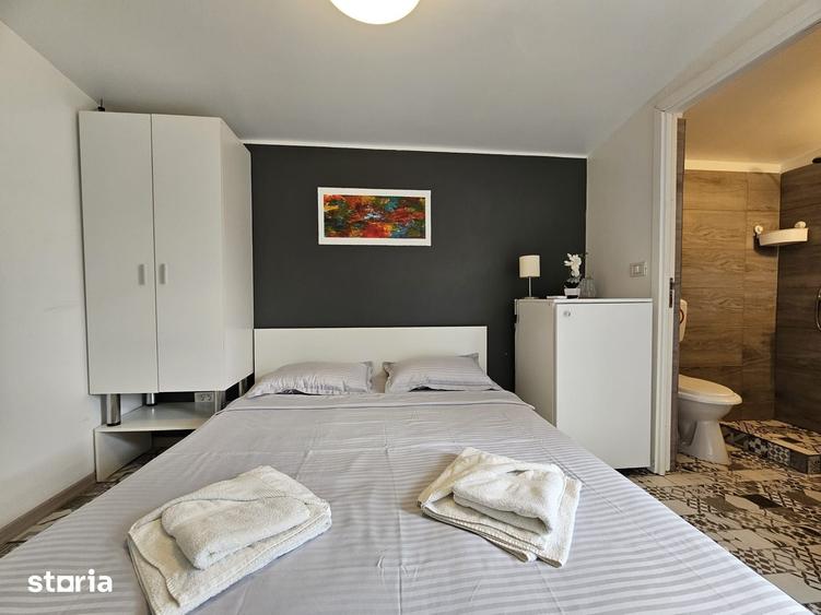 Casă cu 7 camere cu Teren 500 Mp în Central