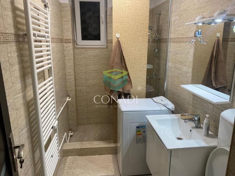 Apartament cu 3 camere semidecomandat, mobilat în Calea București