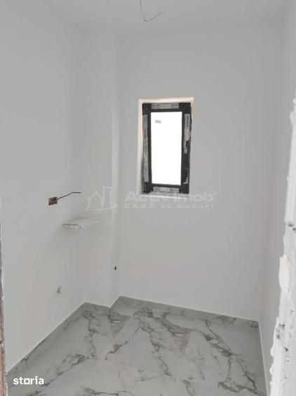 Casă cu 4 camere cu Teren 370 Mp în Central