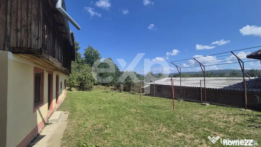 Casă cu 5 camere cu Teren 1005 Mp în Băjești