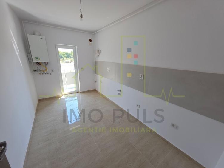 Apartament la parter cu balcon. Bucatarie separata. Loc de parcare - 2