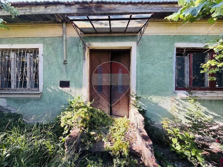 Casă cu Teren 495 Mp în Girocului