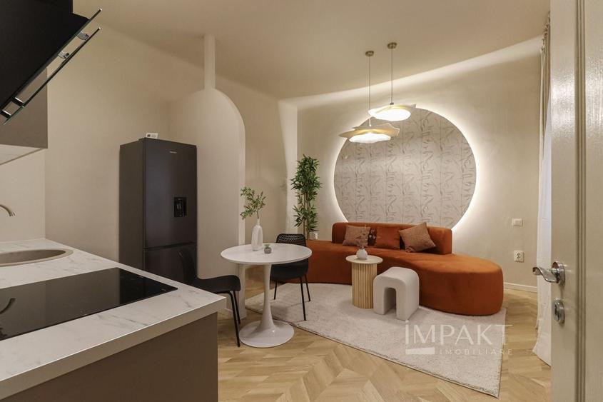 Apartament cu 2 camere semidecomandat, mobilat în Central