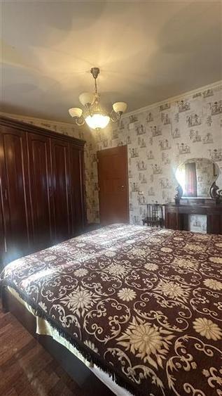 Casă individuală cu 7 camere cu Teren 660 Mp în Lazu