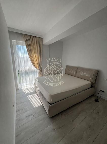 Apartament cu 2 camere semidecomandat, mobilat în Calea Moldovei