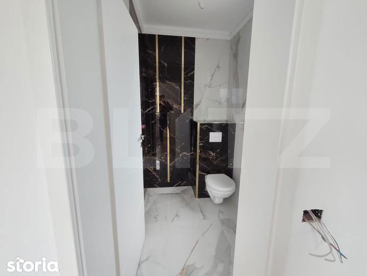 Apartament modern pe doua niveluri in Sanmartin loc de parcare/gradina - 10