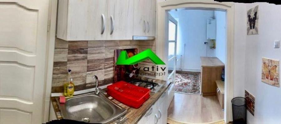 Garsoniera decomandata etaj1 curte Sibu str.9 Mai - 3