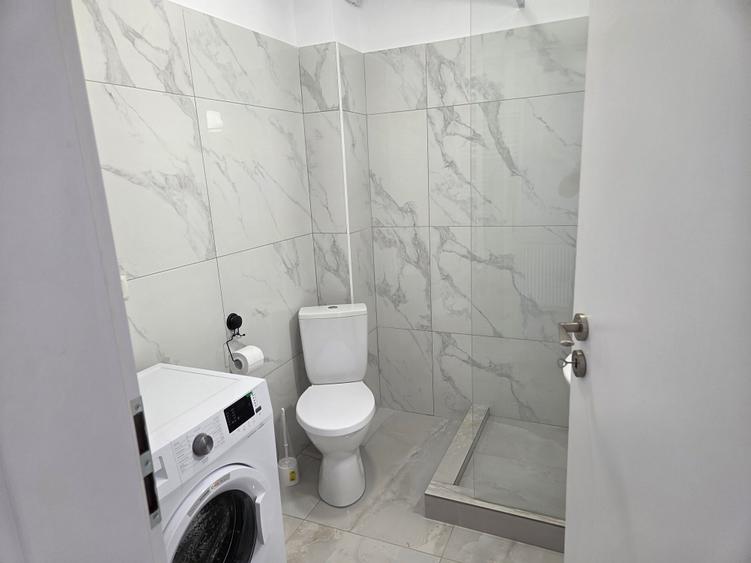 Garsoniera utilata,mobilata ,totul nou ,prima inchiriere ,str Oituz nr 71 - 11