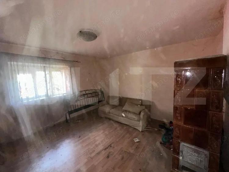 Casa de vanzare pe un teren 2500 mp, strada inchisa, utilitati, atelier + garaje - 2