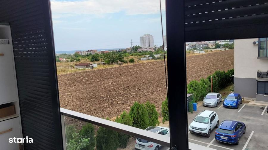 DE VANZARE APARTAMENT CU VEDERE LATERALA LA MARE, COMPLET MOBILAT - 8