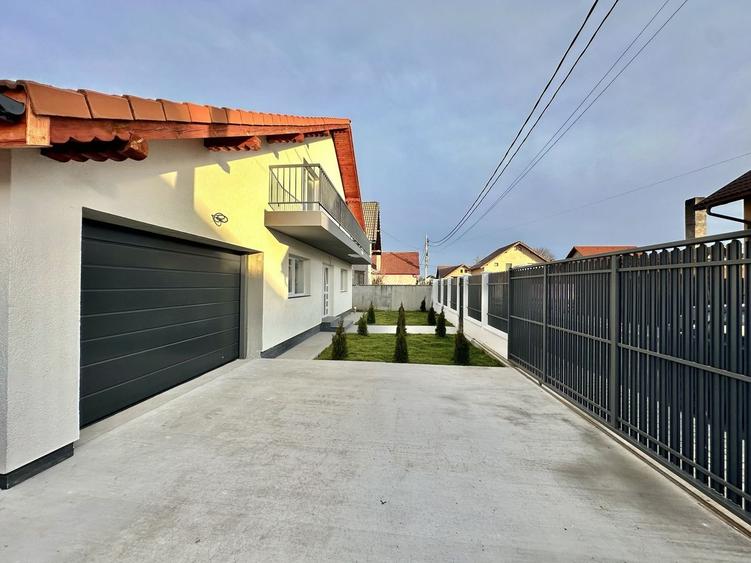 Casă individuală de vanzare  cu garaj și curte proprie – Hălchiu - 26