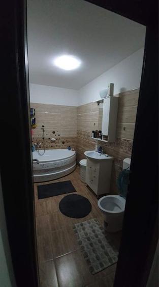Apartament cu 2 camere decomandat în Ozana