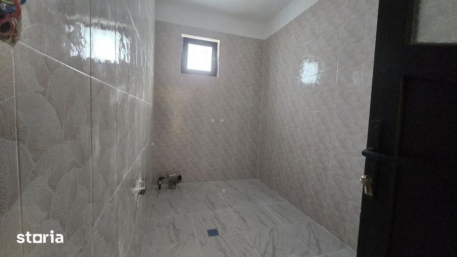 Casă cu 3 camere cu Teren 420 Mp în Holboca