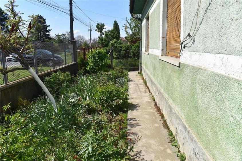 Casa caramida plus o casa de vaiuga - teren generos 1400 mp - doua fronturi stra - 9