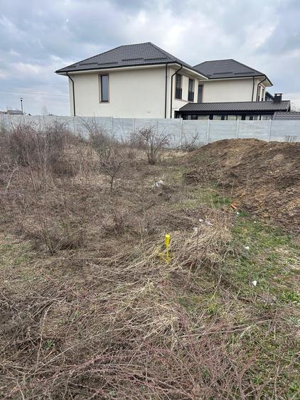 Teren intravilan cu AC în Bragadiru ,Str Curcubeului.410 mp .Deschidere 24 ml. - 2