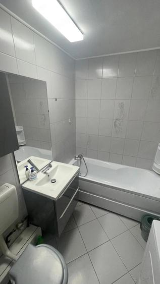 Inchiriez apartament 2 camere, decomandat, cf. 1 - 2