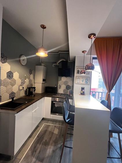 Oază de liniște la Unirii: Apartament modern în bloc nou, costuri minime - 5