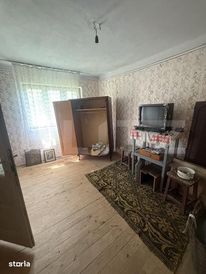 Casă cu 4 camere cu Teren 1000 Mp în Voinești