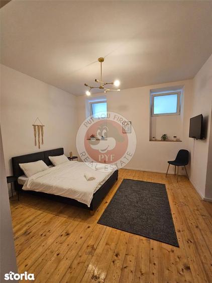 Apartament cu 4 camere decomandat în Romană