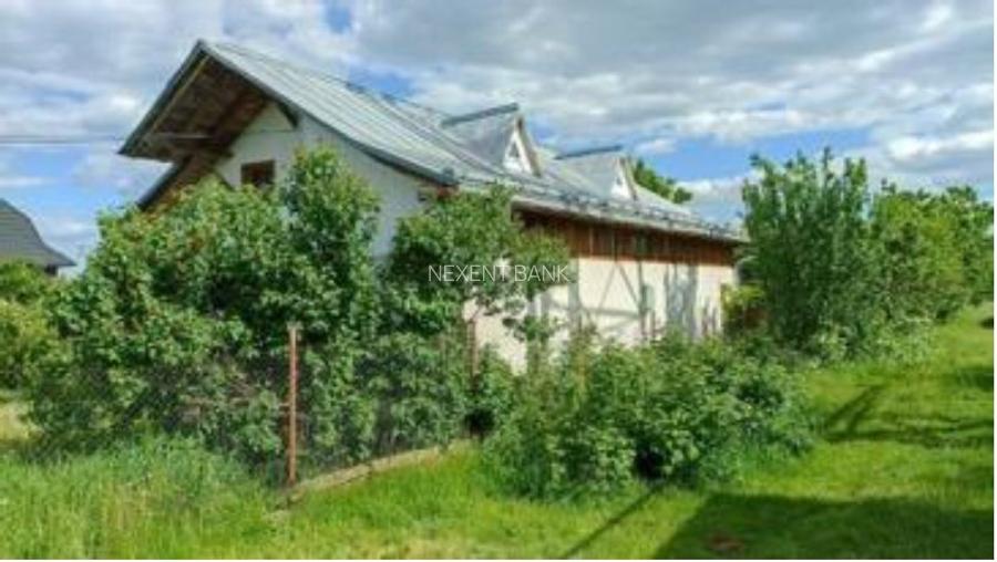 Prorietate  formata din Teren intravilan, casa si teren extravilan