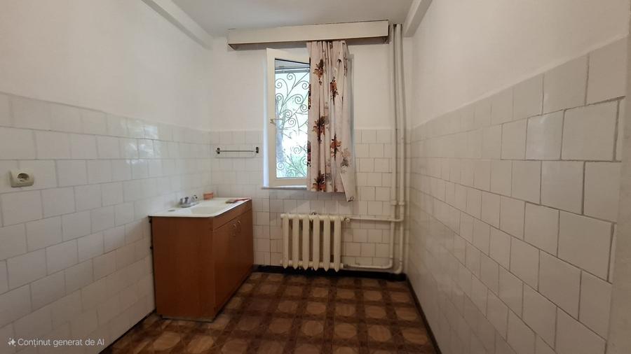 Strada Traian - ap 2 cam , parter /10 , gaze la usa (cf 1) SU 48 mp - 12