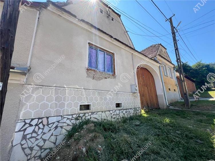 Casă individuală cu 5 camere cu Teren 489 Mp în Central