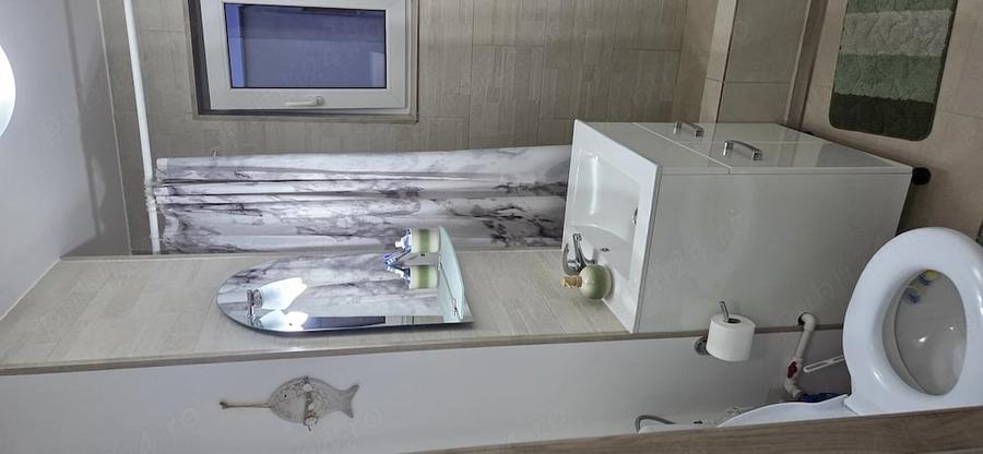Apartament cu 3 camere semidecomandat în Central