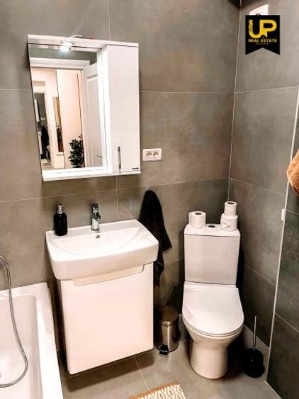 Apartament cu 2 camere semidecomandat, mobilat în Rahova