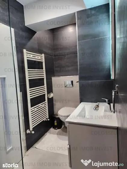 Apartament cu 4 camere decomandat în Tractorul