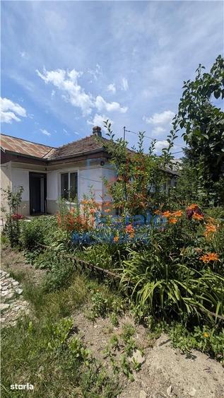 Casă cu 3 camere cu Teren 200 Mp în Podu Roș