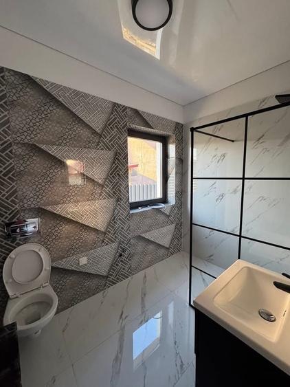 Apartament cu 4 camere decomandat în Bascov