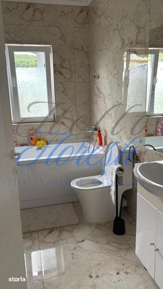 Casă cu 4 camere cu Teren 1500 Mp în Suatu