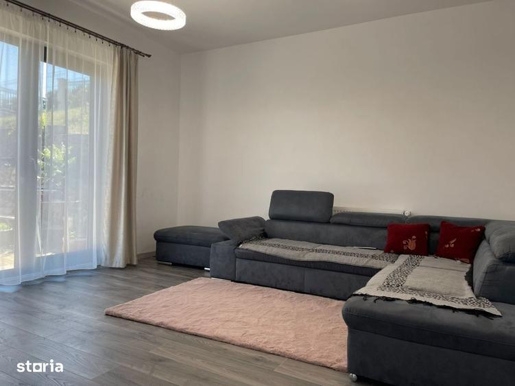 Casa individuala de vanzare cu 4 camere, amplasata pe un teren de 412 - 13