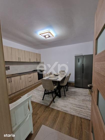 Casă cu 4 camere cu Teren 700 Mp în Comișani