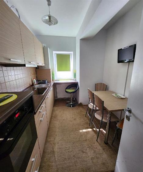 Apartament cu 2 camere decomandat, mobilat în Dâmbovița