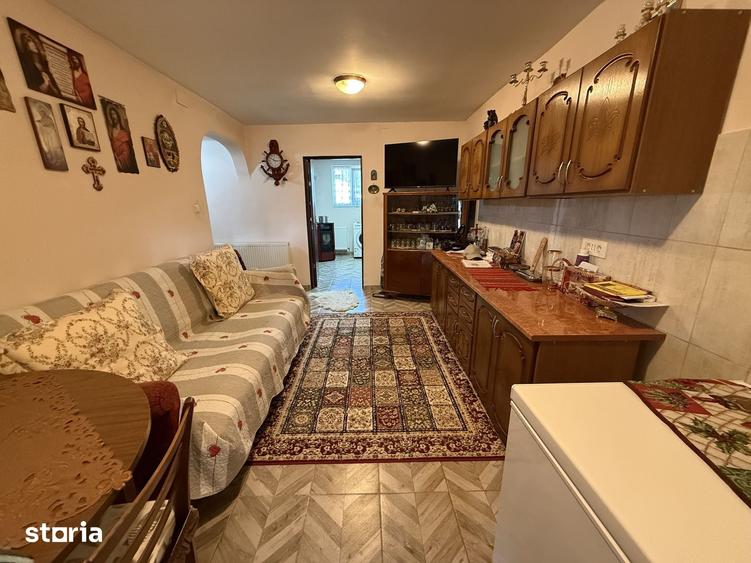 Casă cu 4 camere cu Teren 1390 Mp în Voinești