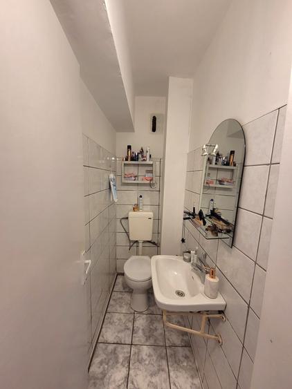 Apartament cu 3 camere decomandat în Calea București