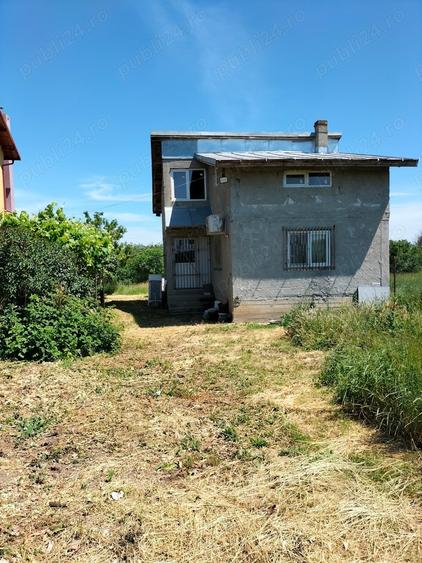 Casă cu 4 camere în Dragomirești-Deal