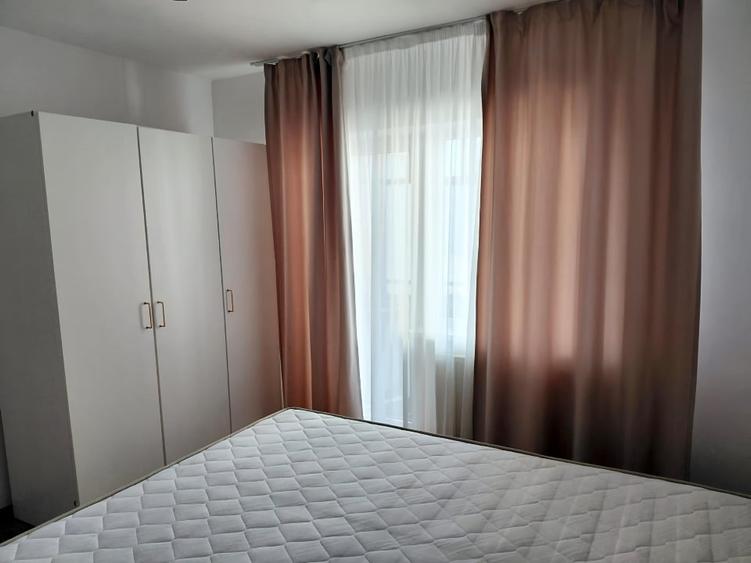 Apartament cu 2 camere semidecomandat, mobilat în Central