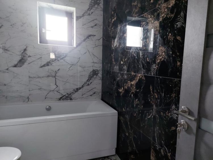 Casă individuală cu 4 camere cu Teren 500 Mp în Corușu