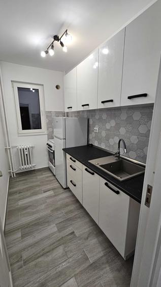 Apartament cu 2 camere decomandat în Podu Roș