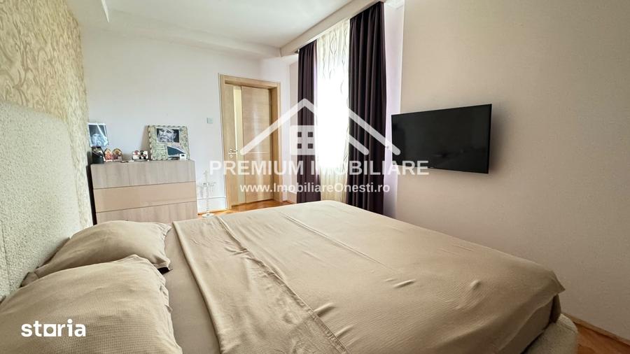 Apartament spa?ios cu 3 camere One?ti, zona centrala - 18