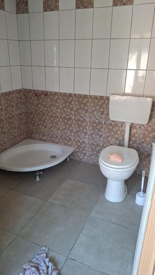 Casă cu 4 camere în Potlogi