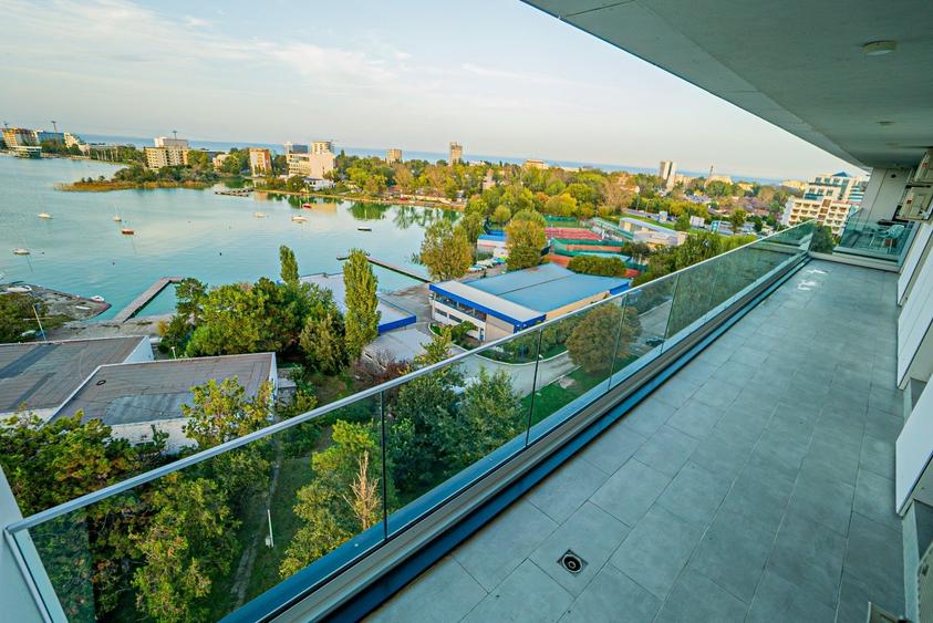 VÂNZARE APARTAMENT 4 CAMERE – VEDERE CĂTRE LAC-LOC DE PARCARE - 1