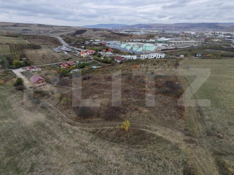 Teren Construcții intravilan de 900 mp, în Dezmir