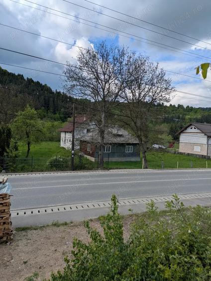 Vand casa ?i teren in comuna Moisei langa drumul principal DN 18 - 2