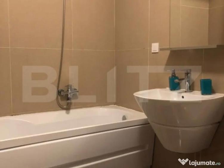 Garsoniera cu gradina intr-o zona pitoreasca din cartierul S - 5