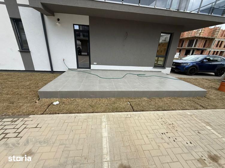 APARTAMENT DECOMANDAT CU TERASA DE 18 MP SI GRADINA - - 5